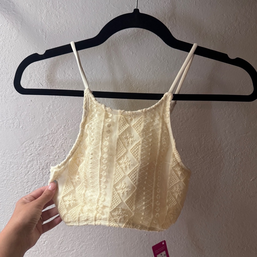 Cream colored high neck bikini top